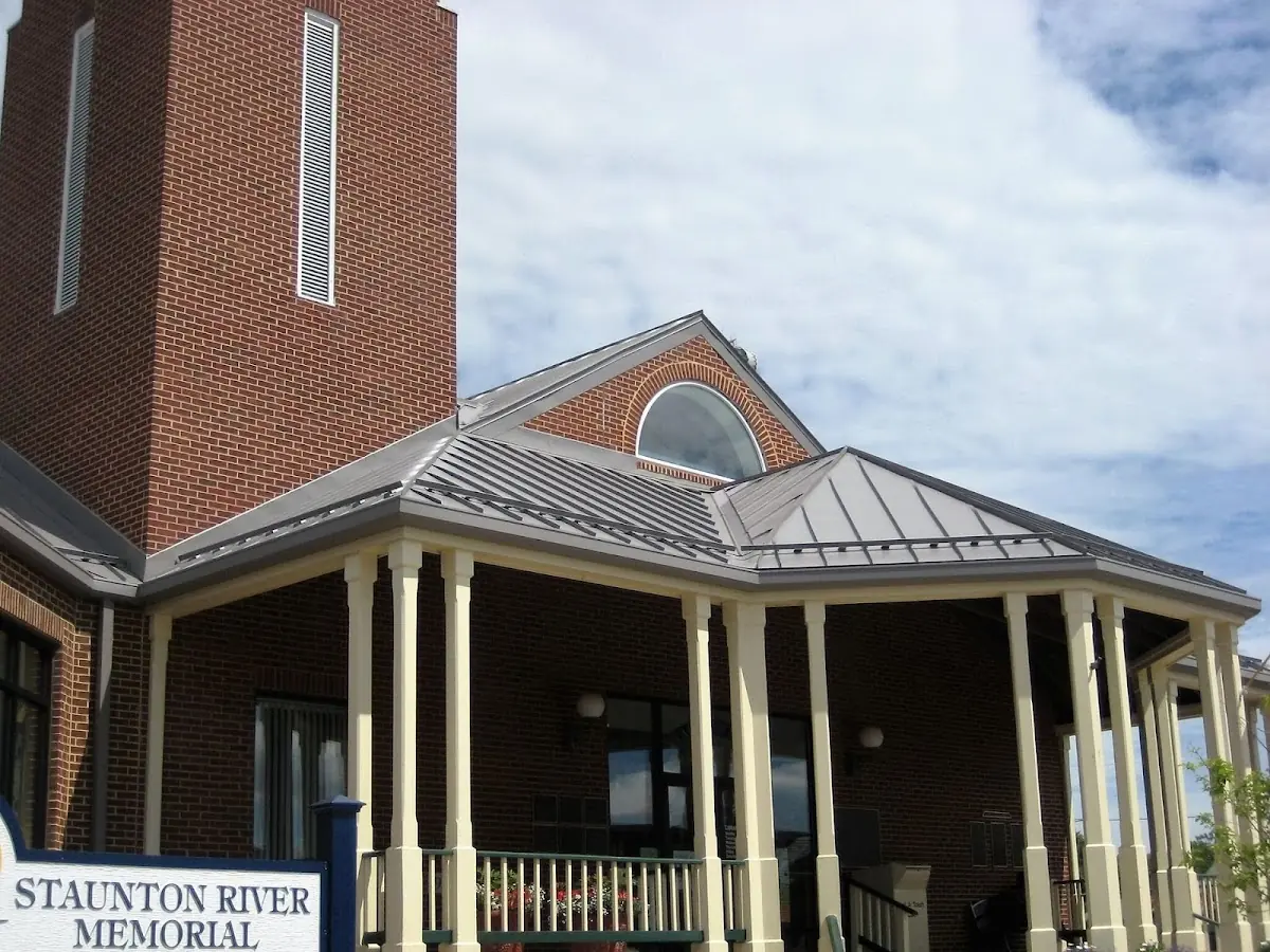 Skilled roofing craftsmen working on a residential roof in Newburyport